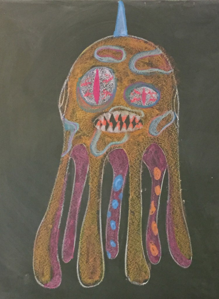 Le commencement du monstre... Un peu de craie, un tableau noir et de l’imagination; voilà le premier portrait de notre Rababou... Maintenant au travail.